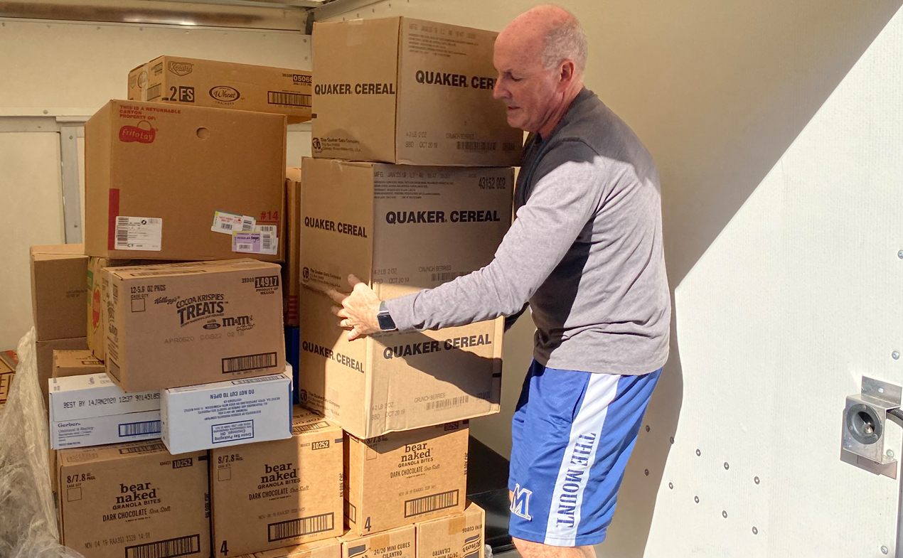 Volunteer Mike Carrying Food Boxes | Our Daily Bread Food Pantry Marco Island
